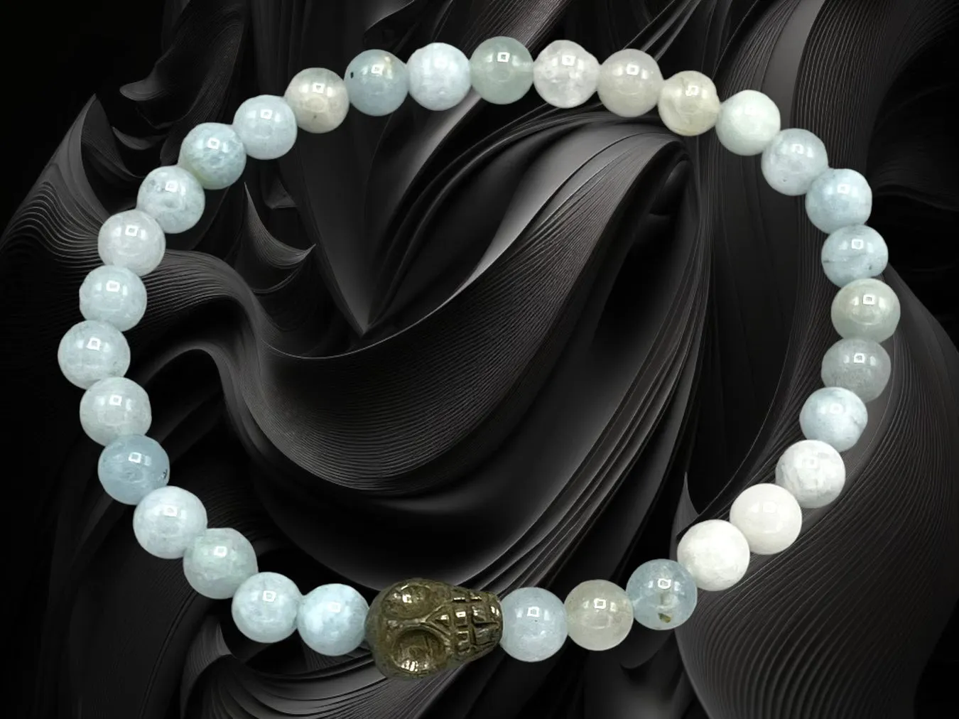 Aquamarine gemstones and Pyrite Skull stretch Bracelet