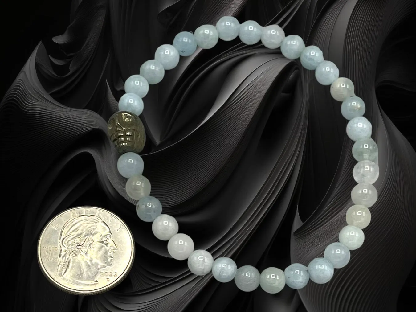 Aquamarine gemstones and Pyrite Skull stretch Bracelet