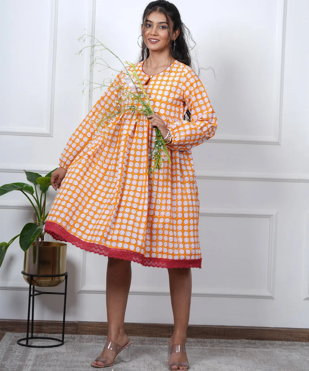 Orange symmetrical handblock printed cotton dress