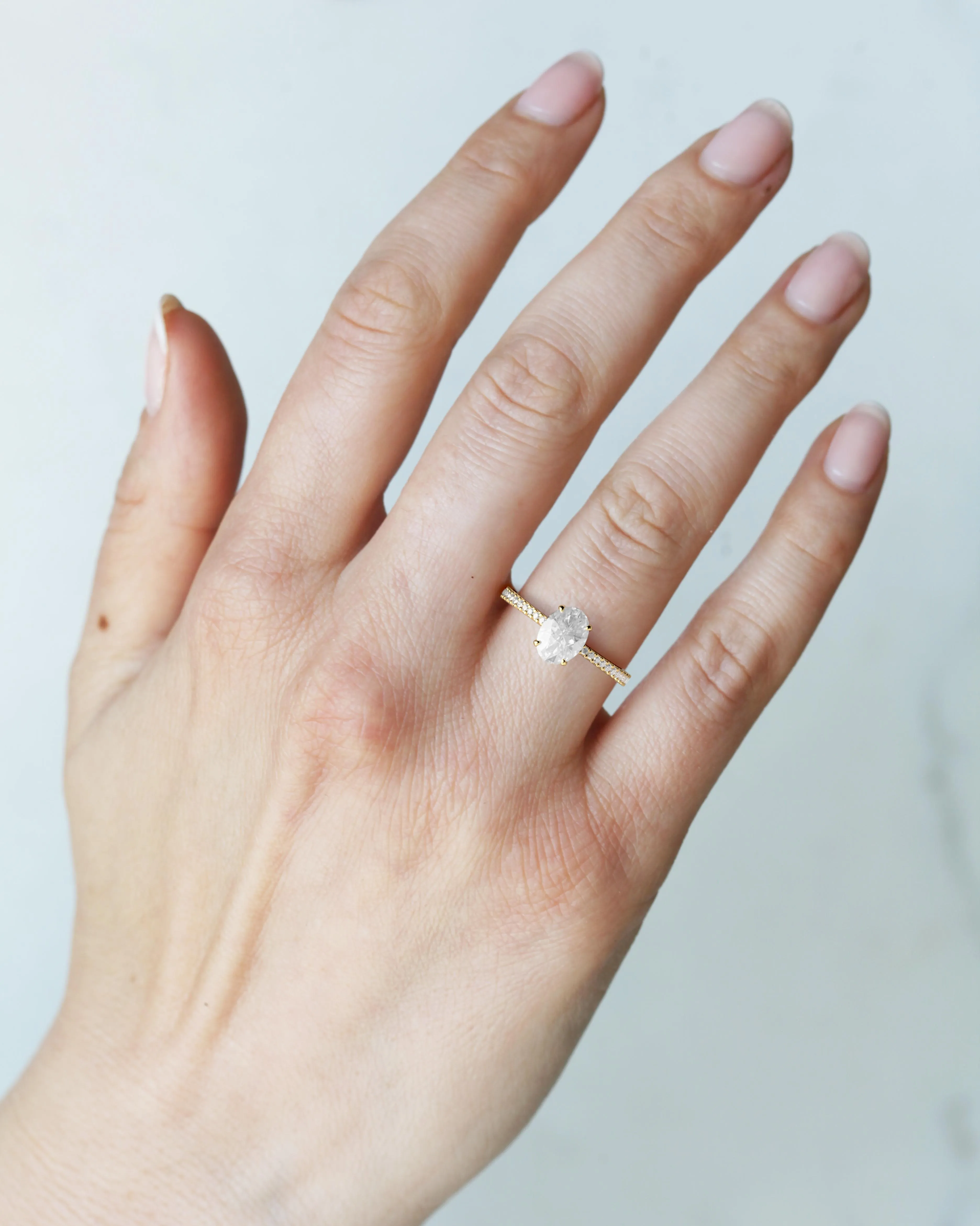 Oval Half Pave Tapered Diamond Ring